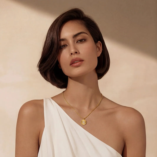 Woman wearing the OLÁA Sunburst Radiance pendant necklace