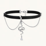 Black leather choker with white gold-plated serpent pendant adorned with zirconia crystals and teardrop charm