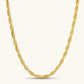 18K gold-plated twisted double herringbone snake chain necklace with lobster clasp and extender on white background.