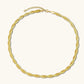 18K gold-plated twisted double herringbone snake chain necklace with lobster clasp and extender on white background.