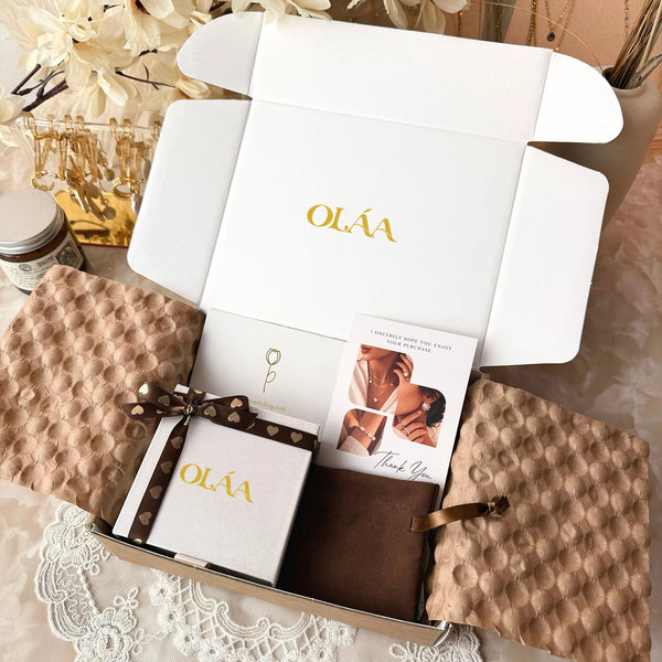 OLÁA branded jewelry packaging example