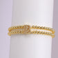A cute and y 18k copper-plated bubble 26-letter elastic string beaded bracelet