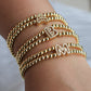 A cute and y 18k copper-plated bubble 26-letter elastic string beaded bracelet