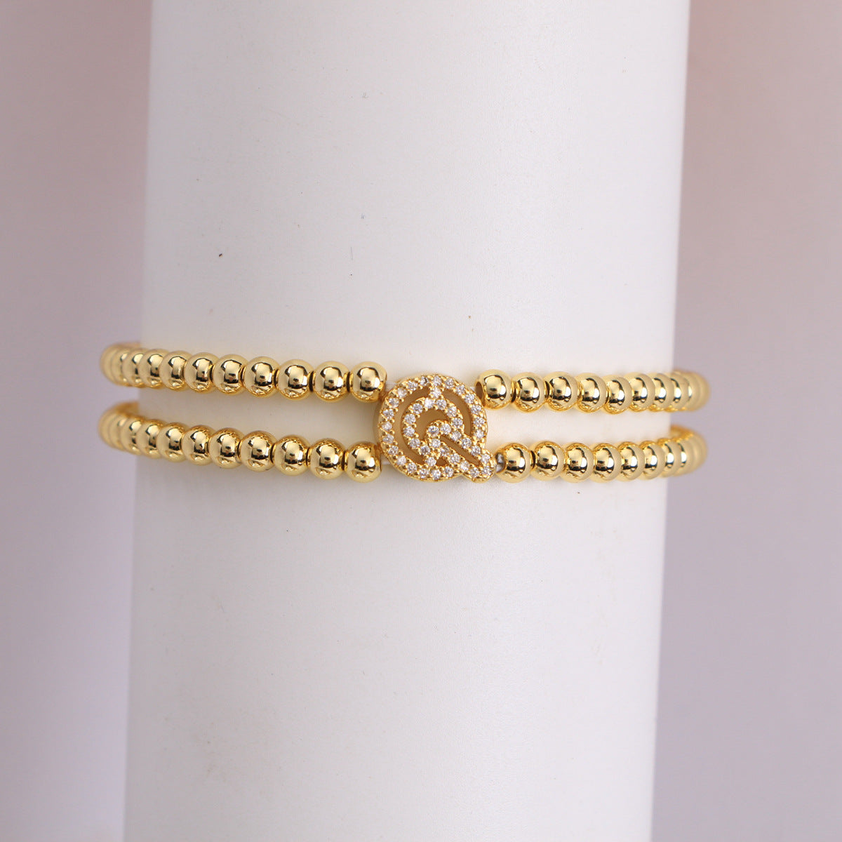 A cute and y 18k copper-plated bubble 26-letter elastic string beaded bracelet
