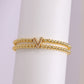 A cute and y 18k copper-plated bubble 26-letter elastic string beaded bracelet