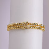 A cute and y 18k copper-plated bubble 26-letter elastic string beaded bracelet