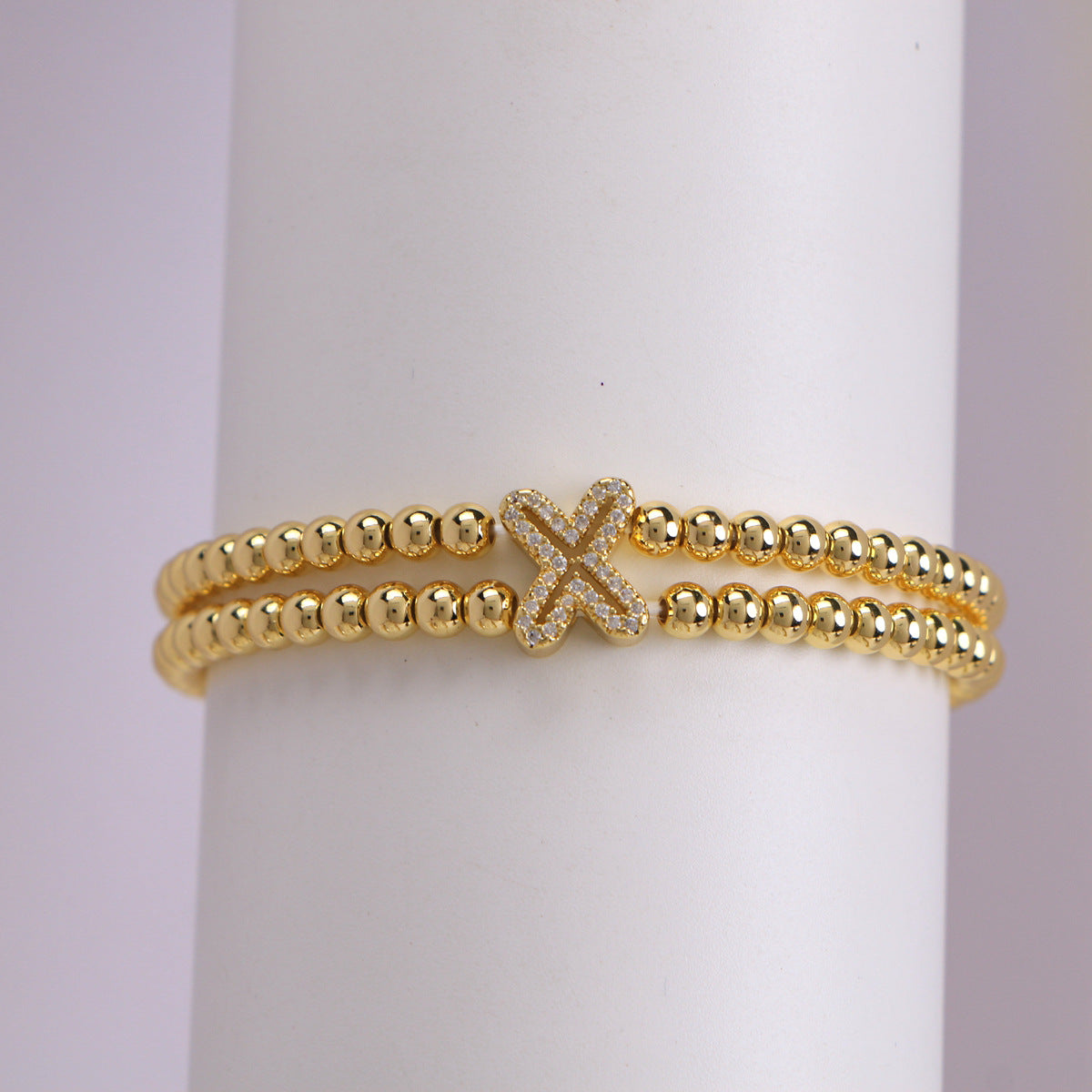 A cute and y 18k copper-plated bubble 26-letter elastic string beaded bracelet
