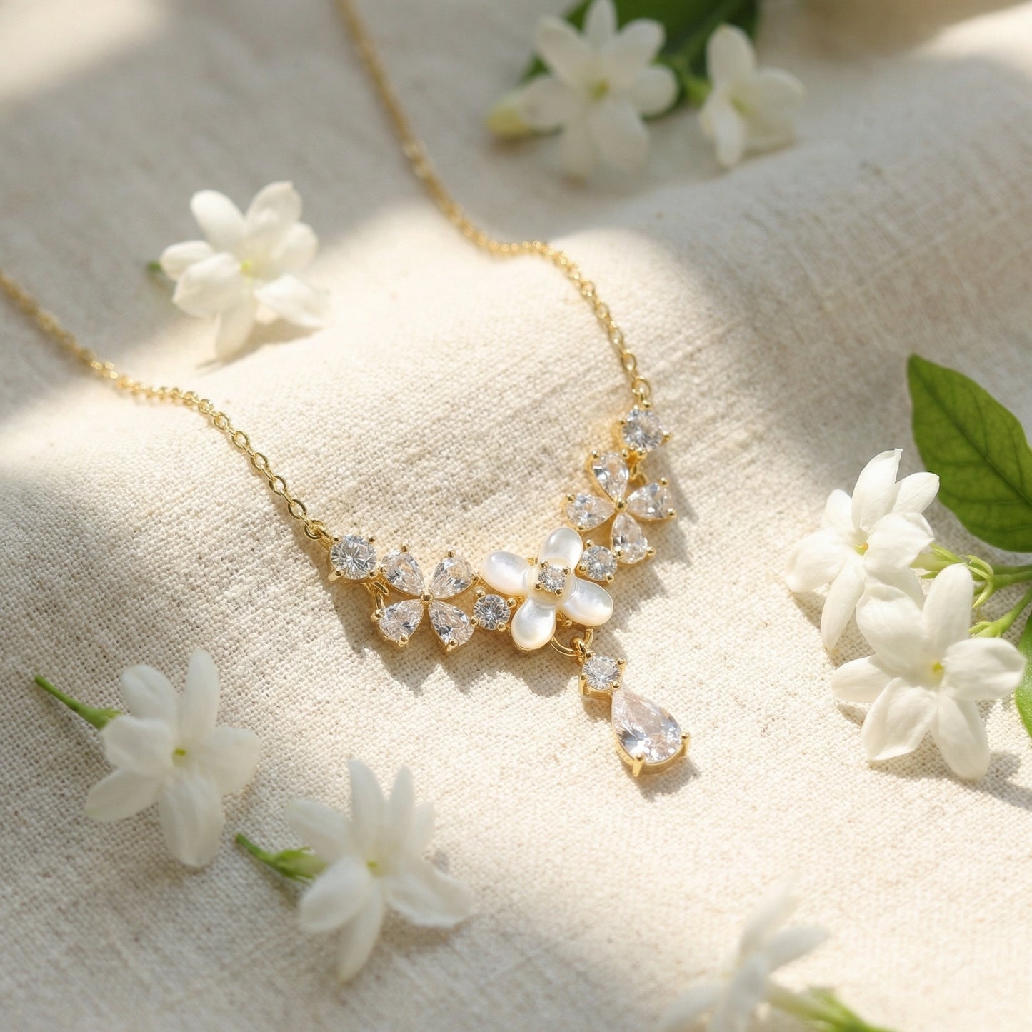 925 Sterling Silver Elegant Mother of Pearl Floral Necklace with Sparkling Pear-Cut Gemstone Accents
