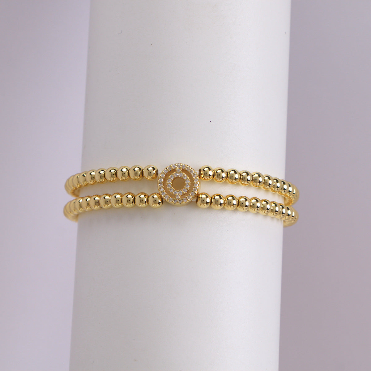 A cute and y 18k copper-plated bubble 26-letter elastic string beaded bracelet